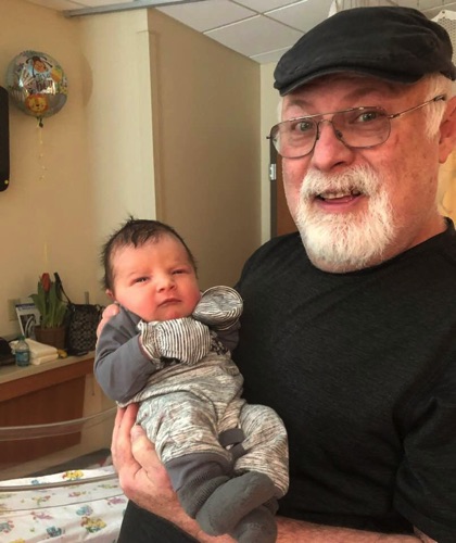 First Time to Hold
My Grandson Silas
